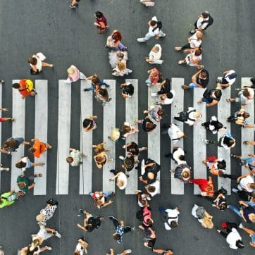 Aerial.,People,Crowd,On,Pedestrian,Crosswalk.,Top,View,Background.